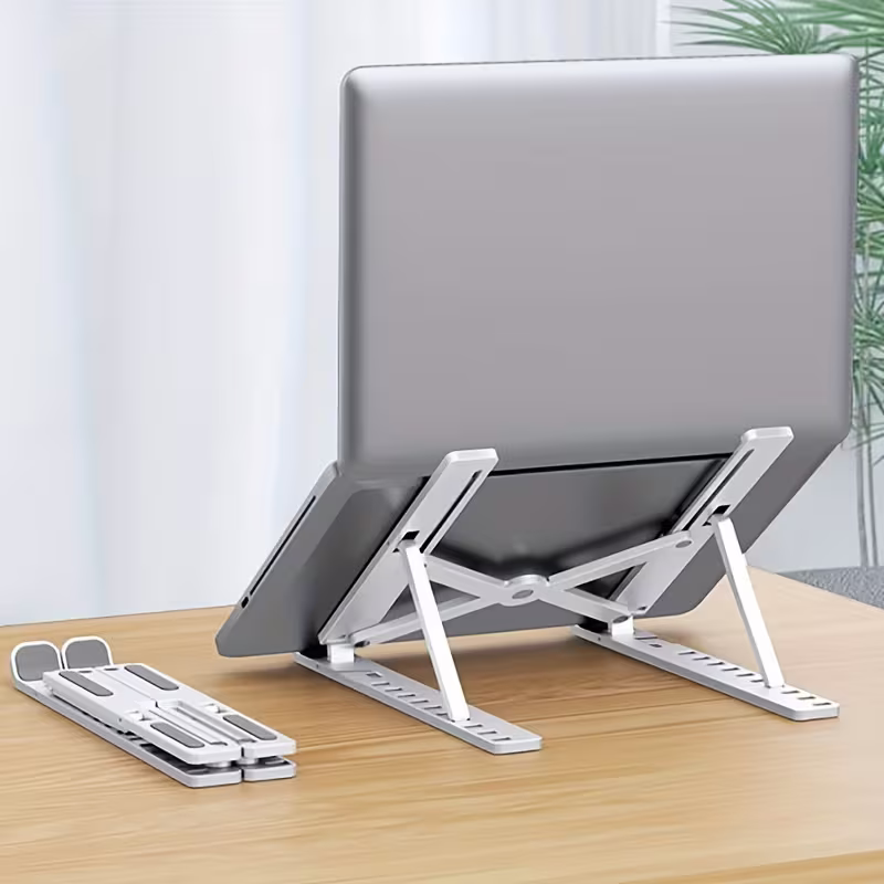 Adjustable Laptop Stand - Foldable Ergonomic Stand for Laptops & Tablets 1 Adjustable Laptop Stand - Foldable Ergonomic Stand for Laptops & Tablets