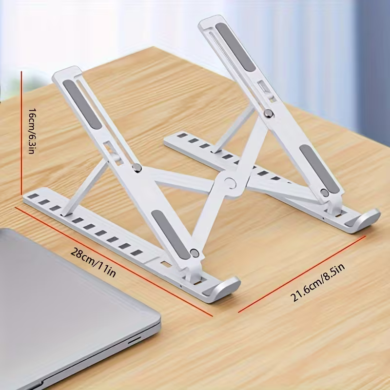 Adjustable Laptop Stand - Foldable Ergonomic Stand for Laptops & Tablets 4 Adjustable Laptop Stand - Foldable Ergonomic Stand for Laptops & Tablets