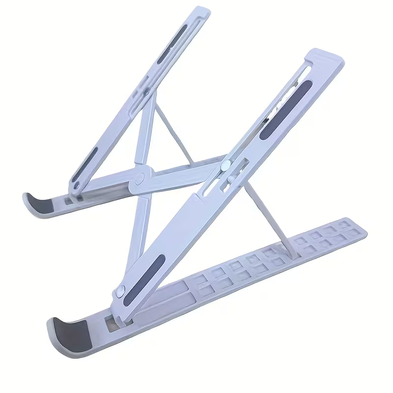 Adjustable Laptop Stand - Foldable Ergonomic Stand for Laptops & Tablets Adjustable Laptop Stand - Foldable Ergonomic Stand for Laptops & Tablets